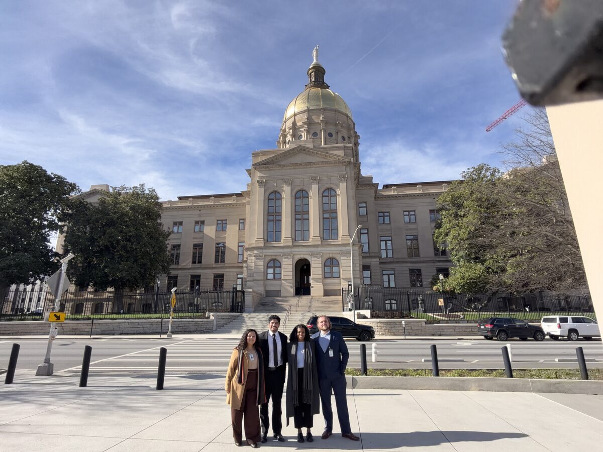The Georgia State Capitol grounds, with people gathered for civic action.